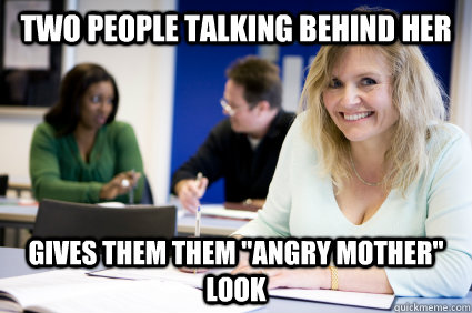 two people talking behind her gives them them 