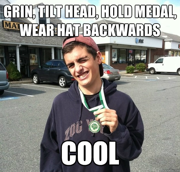 grin, tilt head, hold medal, wear hat backwards cool - grin, tilt head, hold medal, wear hat backwards cool  keith the winner