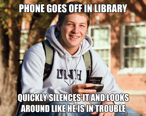 Phone goes off in library quickly silences it and looks around like he is in trouble  College Freshman