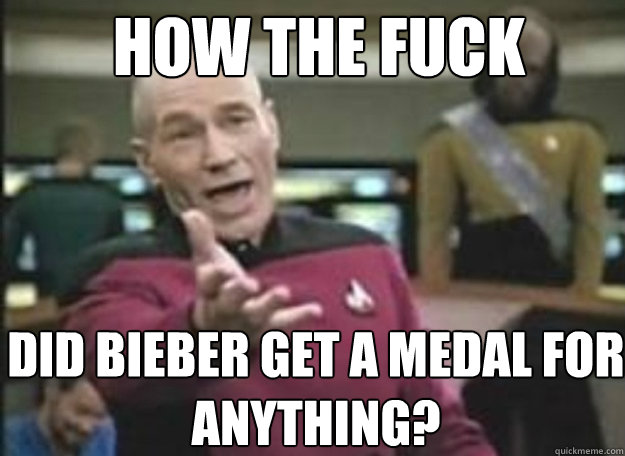 HOW THE FUCK DID BIEBER GET A MEDAL FOR ANYTHING?  how the fuck
