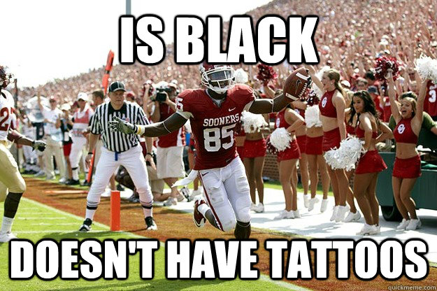 Is black Doesn't have tattoos  