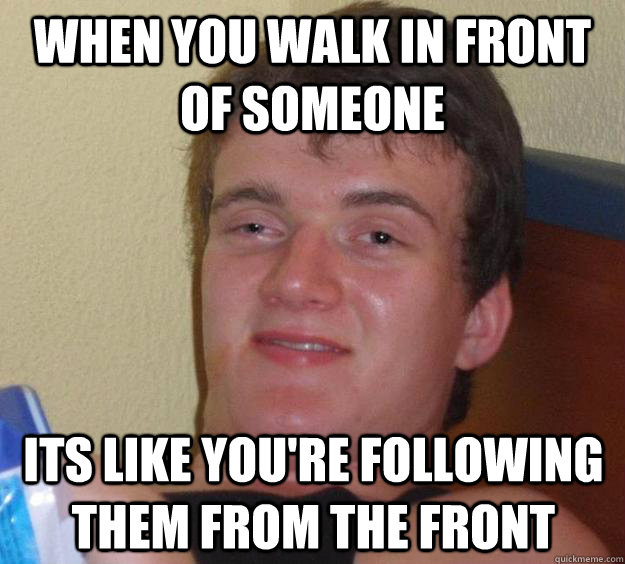 Man Letting Woman Walk In Front Of Him