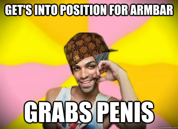 Get's into position for armbar Grabs penis  