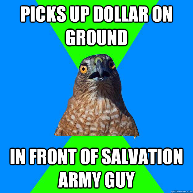 picks up dollar on ground in front of salvation army guy  