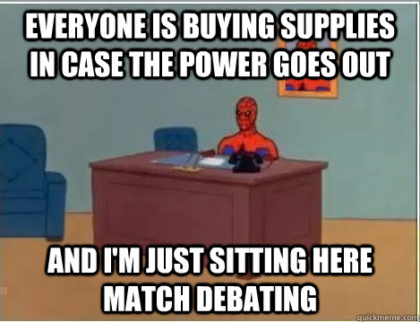 everyone is buying supplies in case the power goes out and i'm just sitting here match debating  Spiderman Desk