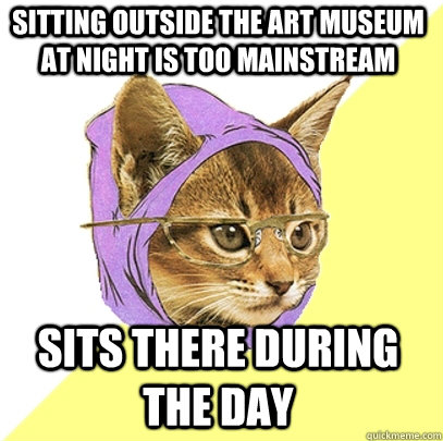 sitting outside the art museum at night is too mainstream sits there during the day  Hipster Kitty