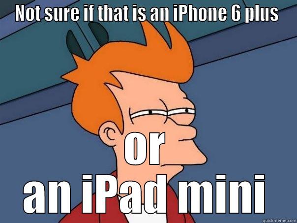 Look iphones - NOT SURE IF THAT IS AN IPHONE 6 PLUS OR AN IPAD MINI Futurama Fry