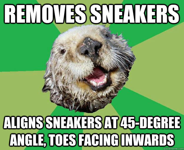 removes sneakers aligns sneakers at 45-degree angle, toes facing inwards  OCD Otter