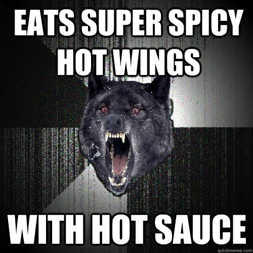 eats super spicy hot wings with hot sauce  Insanity Wolf