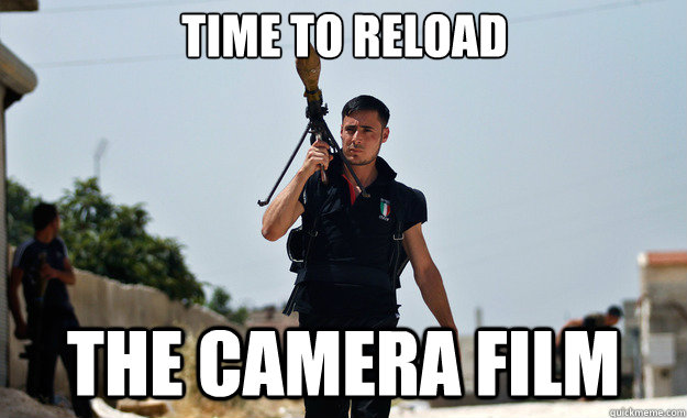 time to reload the camera film   Ridiculously Photogenic Syrian Soldier