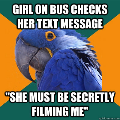 Girl on Bus checks her text message  