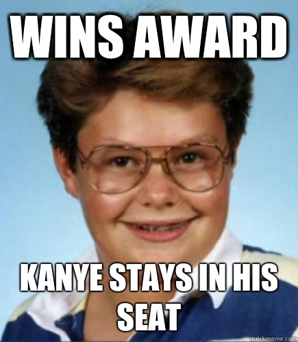 Wins Award Kanye stays in his seat  Lucky Larry