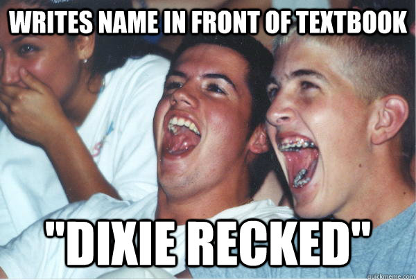 writes name in front of textbook 