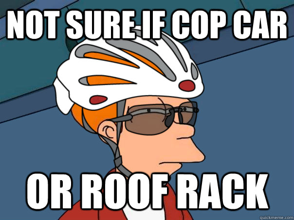 Not sure if cop car or roof rack  road bike fry