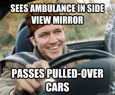 Sees ambulance in side view mirror passes pulled-over cars - Sees ambulance in side view mirror passes pulled-over cars  SCUMBAG DRIVER