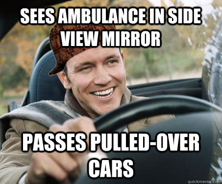 Sees ambulance in side view mirror passes pulled-over cars  SCUMBAG DRIVER