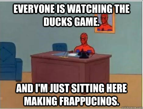 Everyone is watching the Ducks game. and i'm just sitting here making frappucinos.  Spiderman Desk