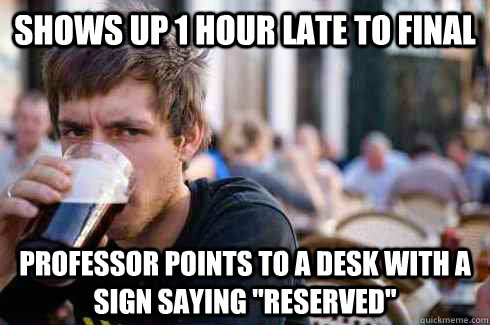 shows up 1 hour late to final professor points to a desk with a sign saying 