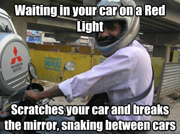 Waiting in your car on a Red Light  Scratches your car and breaks the mirror, snaking between cars - Waiting in your car on a Red Light  Scratches your car and breaks the mirror, snaking between cars  Scumbag bike riders