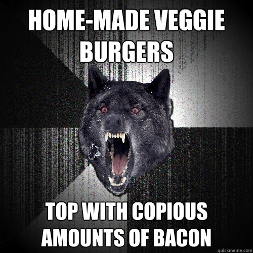 Home-made veggie burgers top with copious amounts of bacon  Insanity Wolf