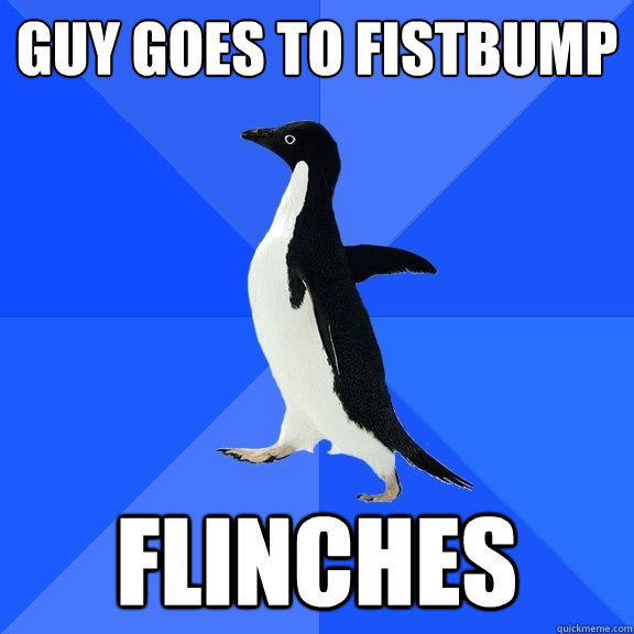 Guy goes to fistbump Flinches  Socially Awkward Penguin