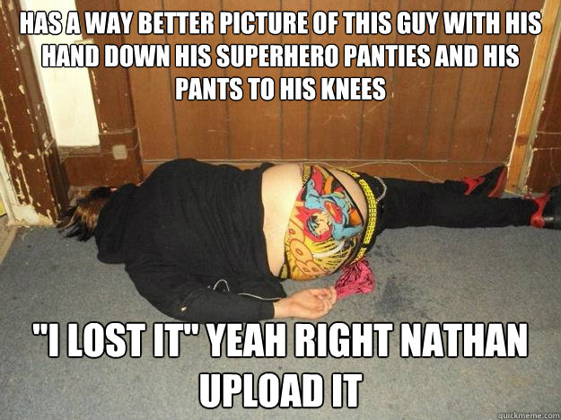 HAS A WAY BETTER PICTURE OF THIS GUY WITH HIS HAND DOWN HIS SUPERHERO PANTIES AND HIS PANTS TO HIS KNEES 