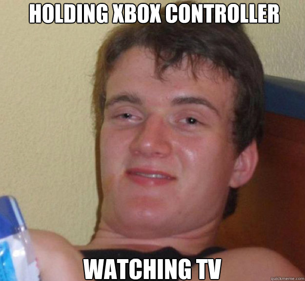 Holding xbox controller Watching tv  ten guy