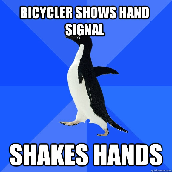 Bicycler shows hand signal shakes hands  Socially Awkward Penguin