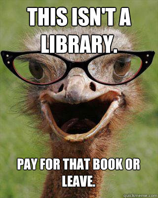 this isn't a library. Pay for that book or leave.  Judgmental Bookseller Ostrich