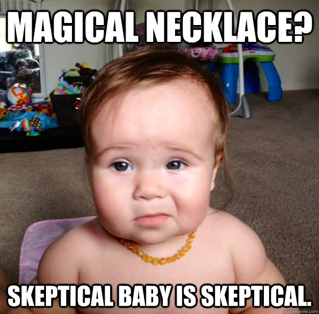 Magical necklace? skeptical baby is skeptical.  skeptic baby