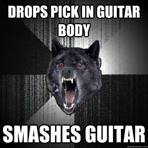 Drops pick in guitar body Smashes guitar  Insanity Wolf