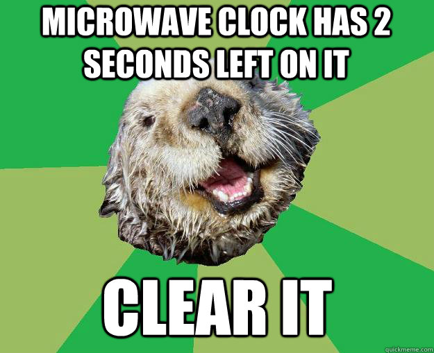microwave clock has 2 seconds left on it clear it  OCD Otter