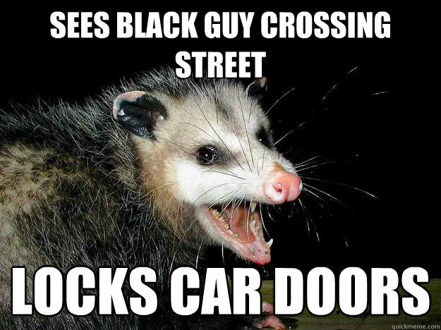 Sees Black guy crossing street Locks car doors  