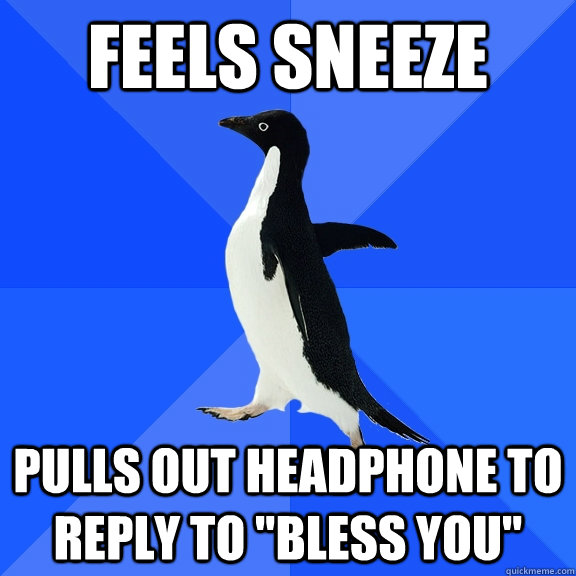 feels sneeze pulls out headphone to reply to 