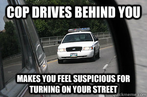 cop drives behind you makes you feel suspicious for turning on your street  guilty conscience driver
