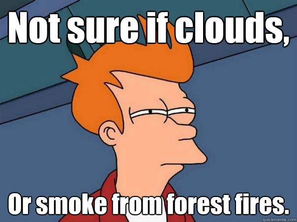 Not sure if clouds, Or smoke from forest fires.  Futurama Fry
