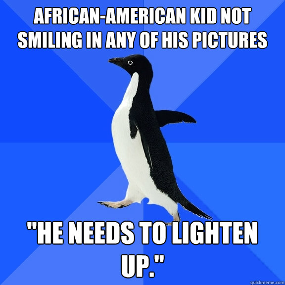 African-American kid not smiling in any of his pictures 
