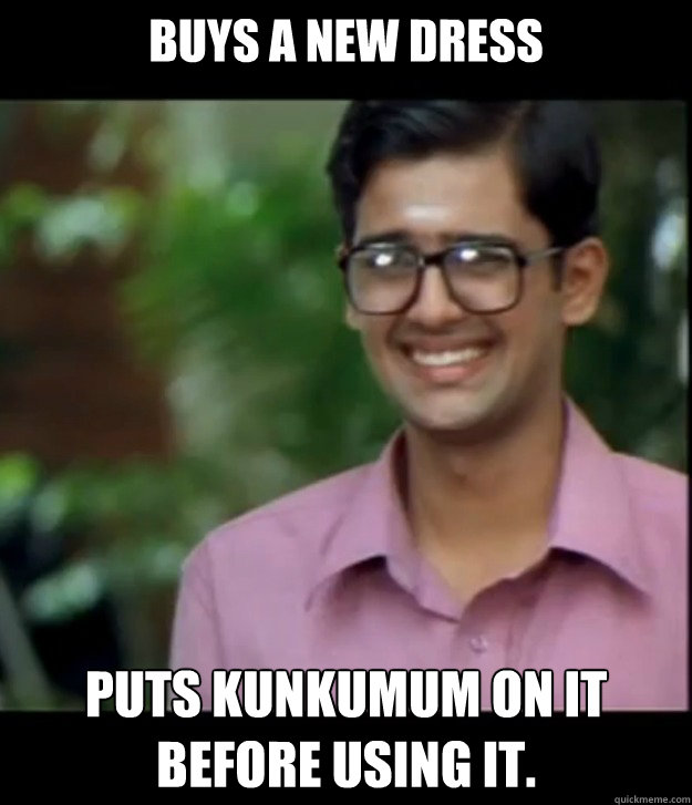 Buys a new dress Puts Kunkumum on it before using it.  Smart Iyer boy