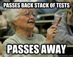 passes back stack of tests passes away  Senior College Student