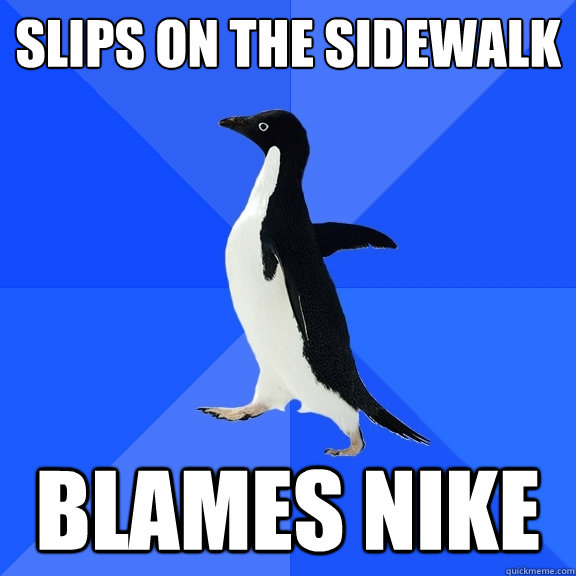 slips on the sidewalk blames nike  Socially Awkward Penguin
