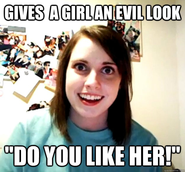 Gives  a girl an evil look 