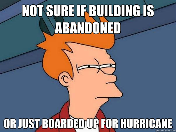 not sure if building is abandoned Or just boarded up for hurricane  Futurama Fry