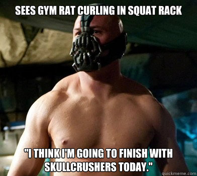 Sees gym rat curling in squat rack 