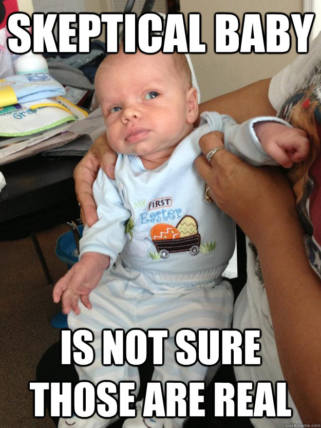 Skeptical baby is not sure those are real  
