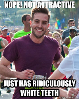 Nope! Not attractive  Just has ridiculously white teeth  Ridiculously photogenic guy