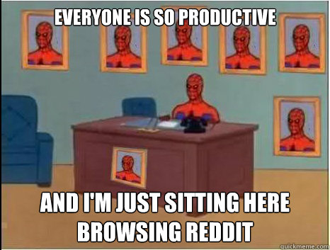 Everyone is so productive And i'm just sitting here browsing Reddit  desk spiderman
