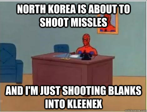 North Korea is about to shoot missles and i'm just shooting blanks into kleenex  Spiderman Desk