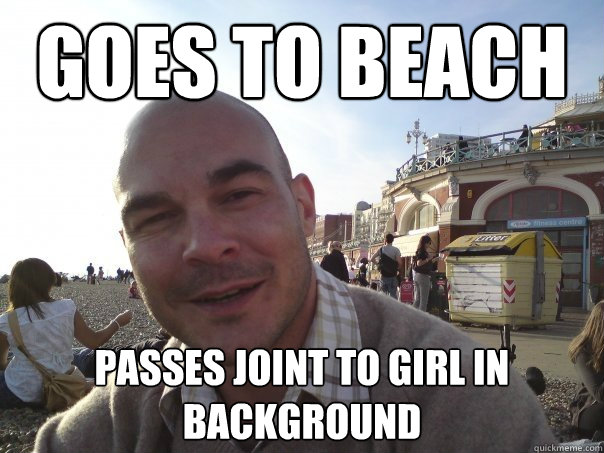 gOES TO BEACH PASSES JOINT TO GIRL IN BACKGROUND  