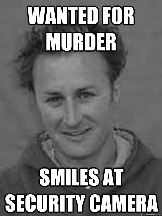 Wanted for murder smiles at security camera  