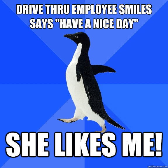 Drive thru Employee smiles says 